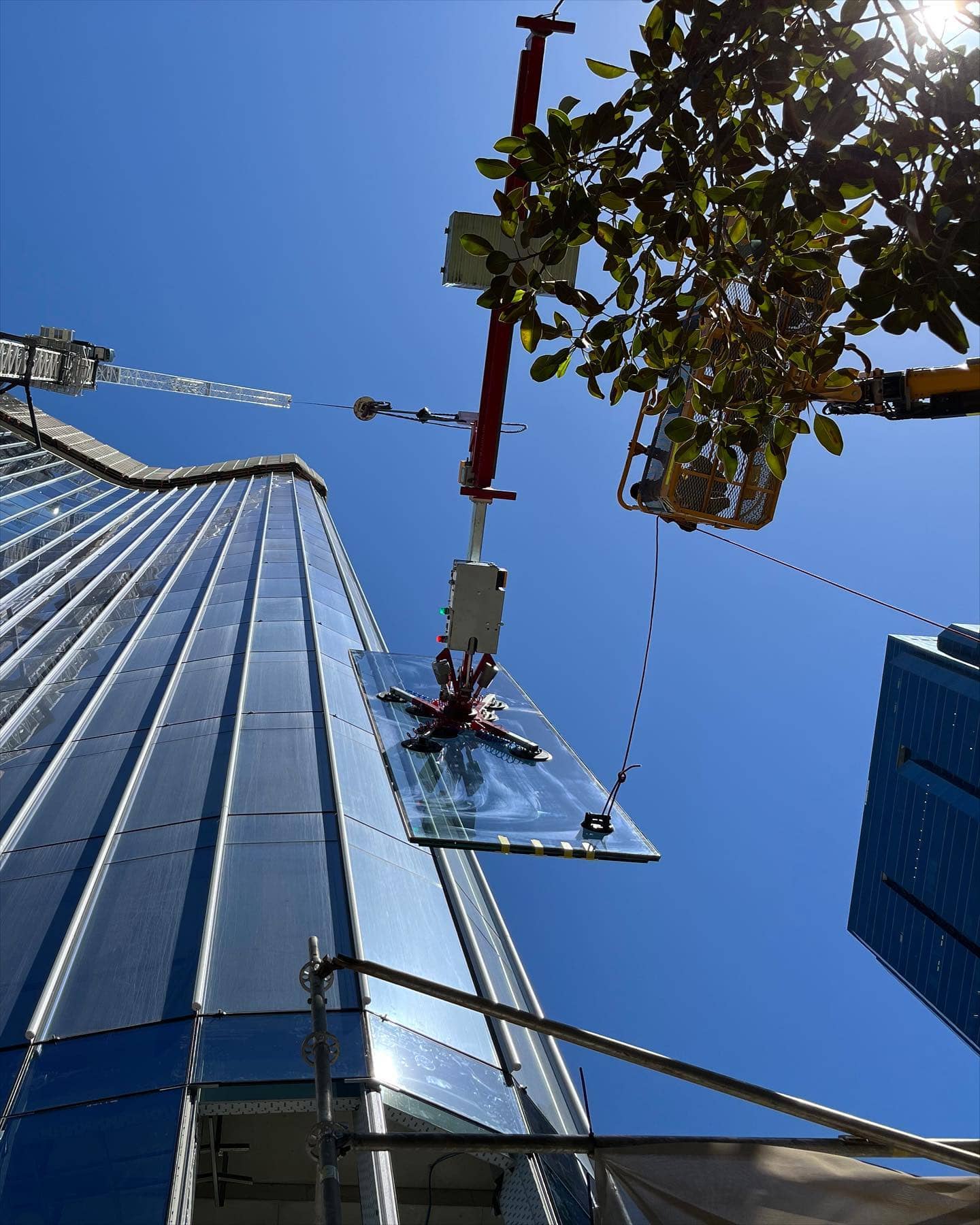 Crane With Offset Lifting Beam And Oktopus Glass Lifter Zone Group